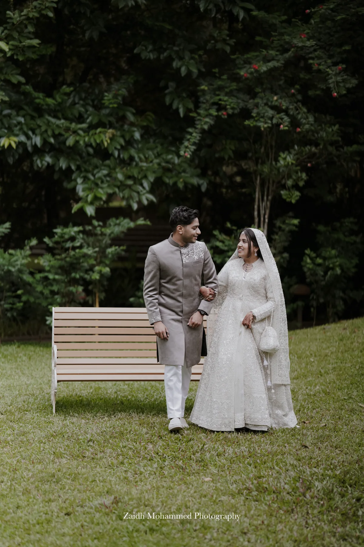A couple standing together in a garden